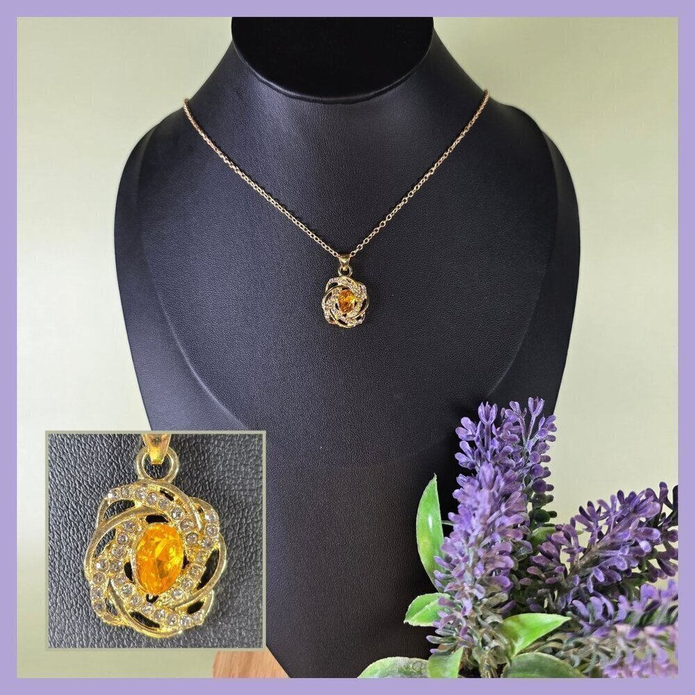 2/$20 Rhinestone Swirl‎ Pendant Necklace With Yellow Rhinestone Center (NWOT)